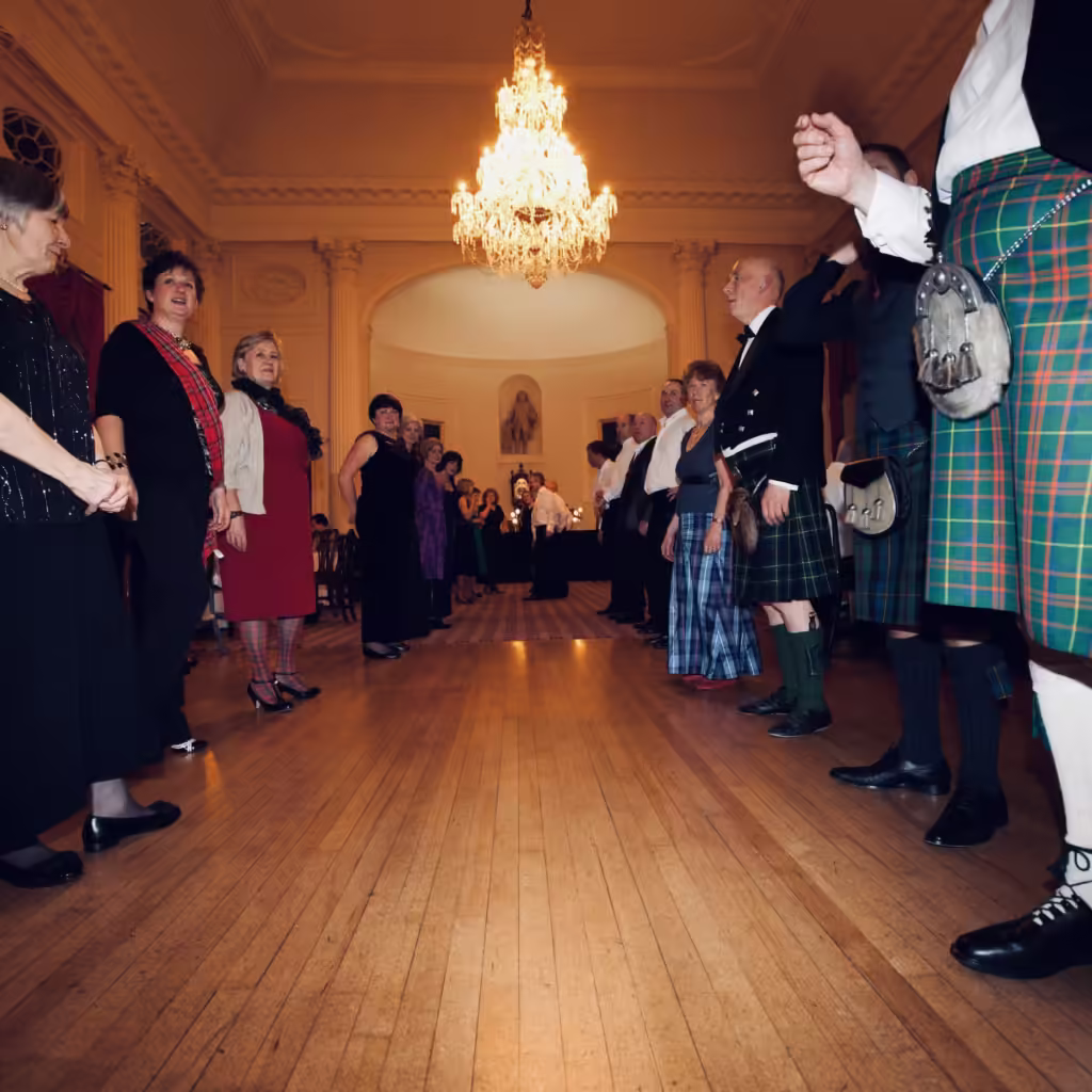 Ceilidh Dancing at the Pump Rooms, Bath Line of dancers enjoying a ceilidh at the Pump Rooms in Bath